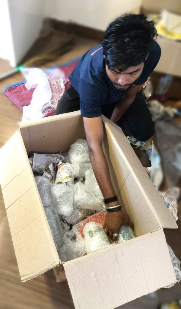 Gosmart movers team packing fragile glass items