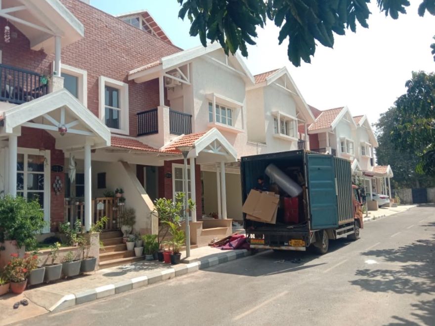 closed container truck for relocating house hold goods from Bangalore to Kerala by GoSmart Movers and packers