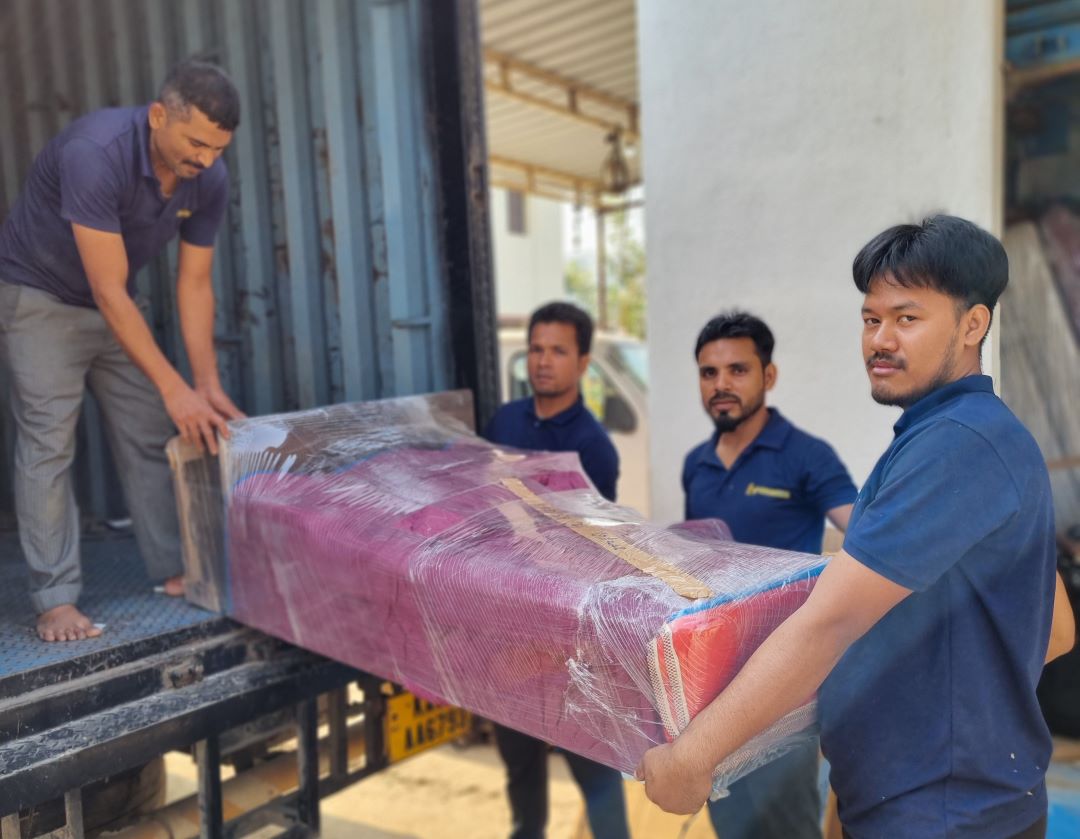 Professionally and safely loading household goods into our truck